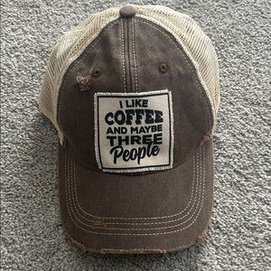 Brown and Tan Cap with Coffee Quote